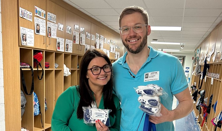 Board members Kathryn Golaszewski and Ian Neitzke at MPS